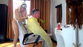 Nudist barbershop. Nude lady hairdresser in an apron. The client is surprised. Cam 2