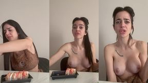 eating sushi topless