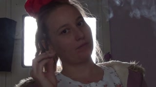 Shadow play while I light a cigarette. Alternative video, by long blonde hair girl