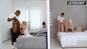 Cowgirl rides his dark cock as she's doggy styled nearby