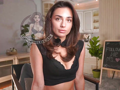 Tattooed Brunette Seductively Poses in Black Lingerie Webcam Show