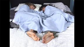 Resting Bare Feet Peek From Under The Covers As Christina Kazan And Jasmine Mancini Lay In Bed!