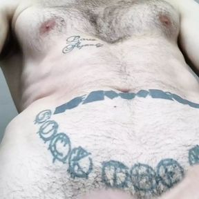 Showing hairy chest and uncut cock