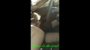 Lover on the road receives handjob and blowjob while driving