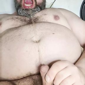 Fat bear pissing in his own mouth