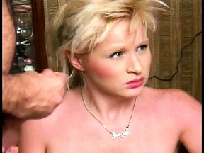 Blonde takes cock on stood while dangles cock in her mouth then fucks
