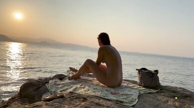 Stranger rubs sunscreen on my red head skin at a nudist beach