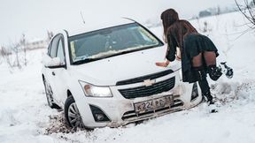 71 STUCK Maria is stuck in the snow in high heels and a beautiful dress