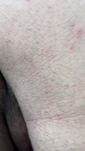 A Macabre Giant Demon Showers in Front of a Tiny Human.