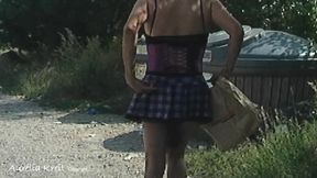 I take out the trash in my school clothes and with a tail plug in my ass on the side of the road while the cars pass by