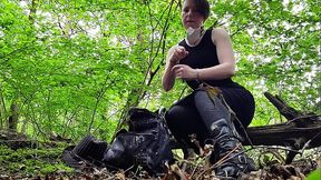 Just a very well stuffed corseted slut playing with a vibrator in the woods....
