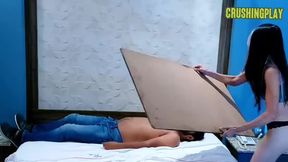 crushed under a board