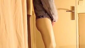 Cock stroking through white vinyl leggings