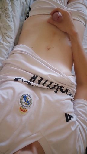 Boy in a Football Uniform