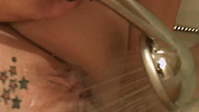 Emo Emily Rubbing shower on her cunt