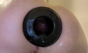 Hot trans girl’s plugged ass squirts on camera