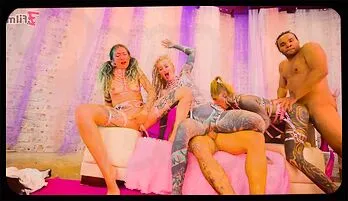 Tattooed Beauties Unite for a Wild Interracial Orgy Experience