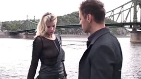 Hot blonde in the grip of two big hard cocks