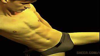 Working Out with Leg Stretches and Moves in Tight Blue Briefs with Sweet Bulge. - young man with a well-defined, muscular physique, toned torso and arms. Full of Joy and Excitement