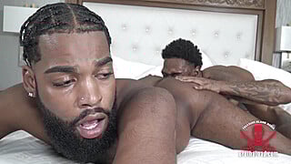 Spreads his ass cheeks and assumes the position