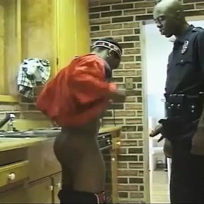 Black Police Guy Sucks a Dude and Bangs His Ass in the Kitchen