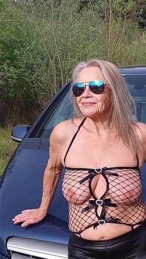 Granny Plays with Her Tits!