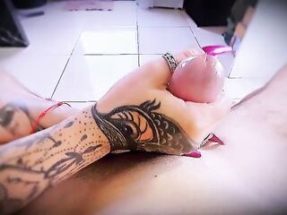 Close-up masturbation with tattooed hands and ring friction.