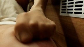 Breast under my pantyhosed feet