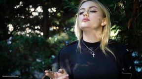 Hot Blonde Babe Smoking Two Black Cigarettes in Nature