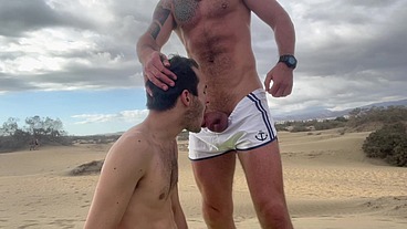 Dom master fucks and uses submissive slut on public beach and pisses inside his ass