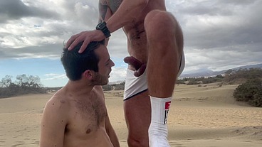 Dom master fucks and uses submissive slut on public beach and pisses inside his ass