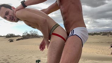 Dom master fucks and uses submissive slut on public beach and pisses inside his ass