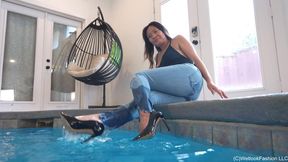 Reyna swimming in the Pool wearing Jeans, Heels and a Swimsuit