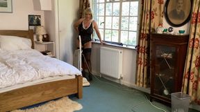 Hoovering David’s bedroom for him…