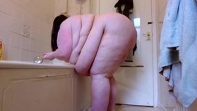Naked SSBBW cleans lower camera view