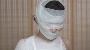 xr267-Wrap the girl in bandages all over her body to make her a mummy