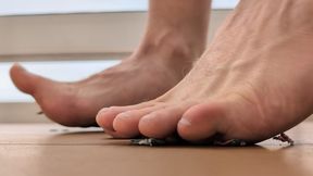 Crushing tiny men on a cruise ship balcony