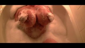 Naked stretch and bubble bath - big fake tits in bathtub after workout