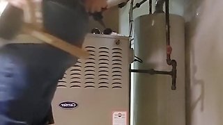 Hvac technician working on customers heater