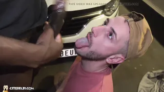 Black hunk dominates white twink in car blowjob session