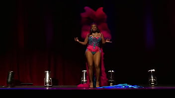 Burlesque beauty performs sultry dance