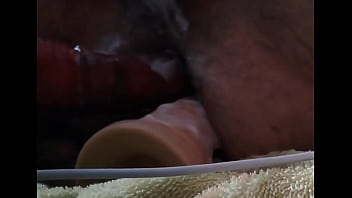 Jugando con dos dildos