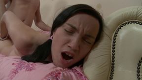 Sexy babe in pigtails bouces up and down on hard cock.