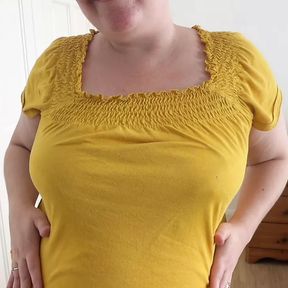 Shy Step Mom posing and stripping in tight shorts and tight yellow Shirt