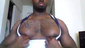 Muscular Black Male Showing Off His Muscles