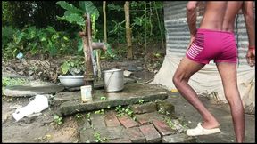 Black mature man bath in desi style. Showing big dick.