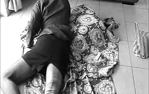 Crossdresser in glasses jerks on a floor