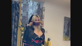Silk scarf gag test in a long satin dress