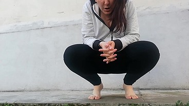 Completely dirty black yoga pants full of pee in public place