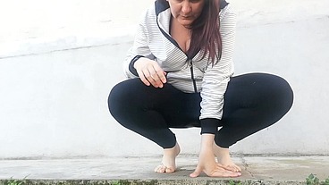 Completely dirty black yoga pants full of pee in public place